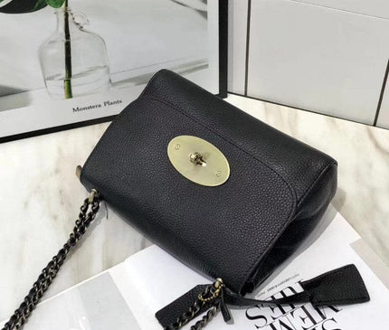 sac-a-bandouliere-rigide-gris-fermeture-laiton-brosse