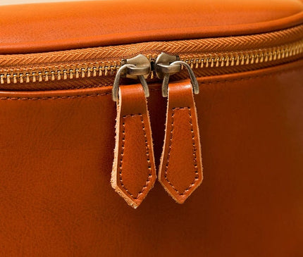sac-bandouliere-arrondi-marron-motifs