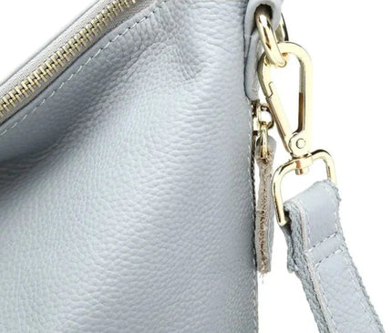 sac-bandouliere-noir-details-metalliques-poches