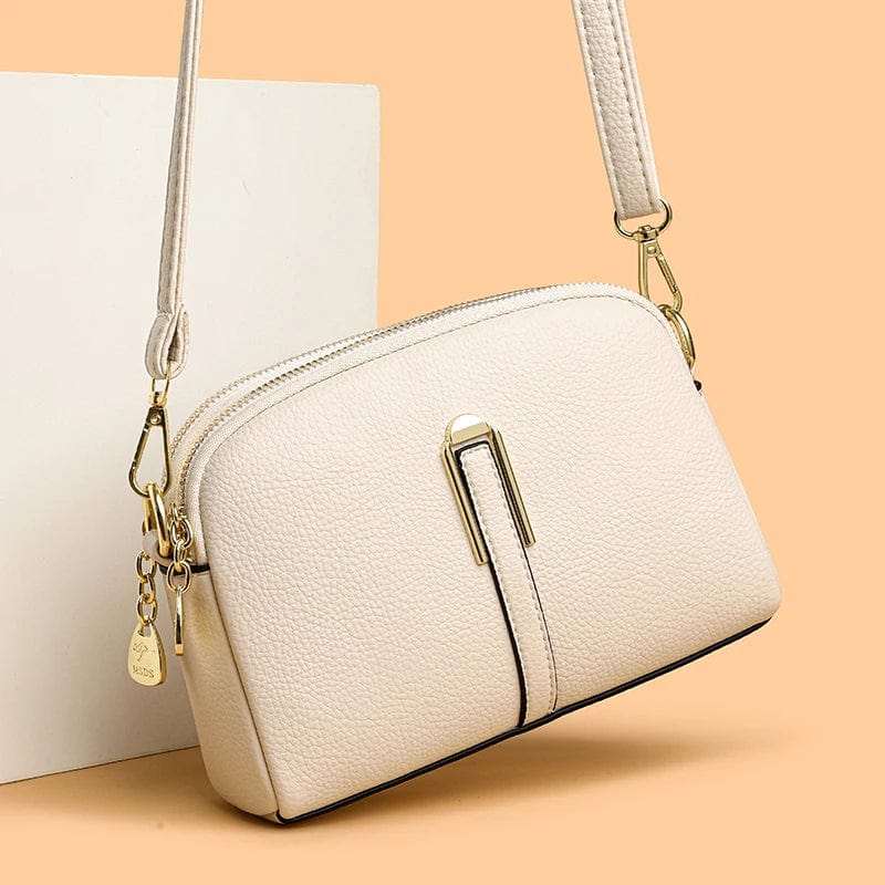 sac-compact-rectangulaire-bandouliere-doree-amovible