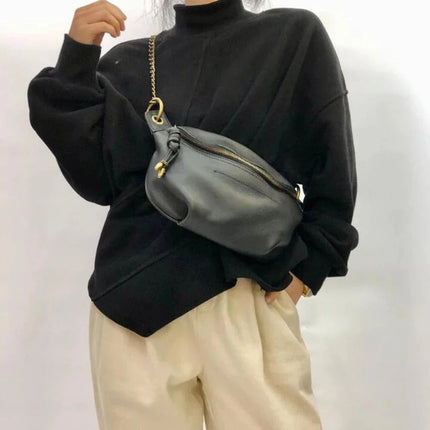 sac-bandouliere-noir-souple-sangle-chaine-doree