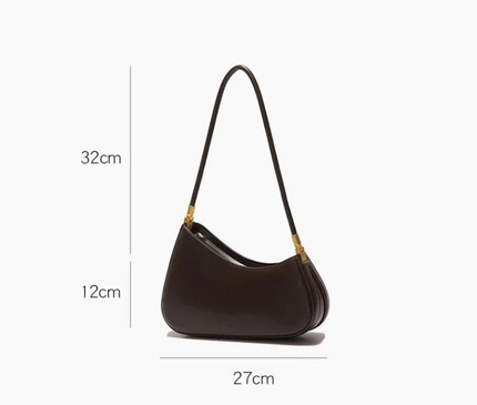 Sac minimaliste avec bandoulière et détails dorés