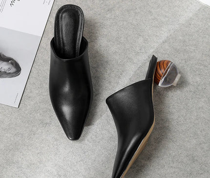 mule-noire-minimaliste-talon-sphere-audacieux