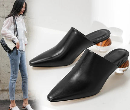 mule-noire-minimaliste-talon-sphere-audacieux