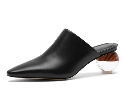 mule-noire-minimaliste-talon-sphere-audacieux