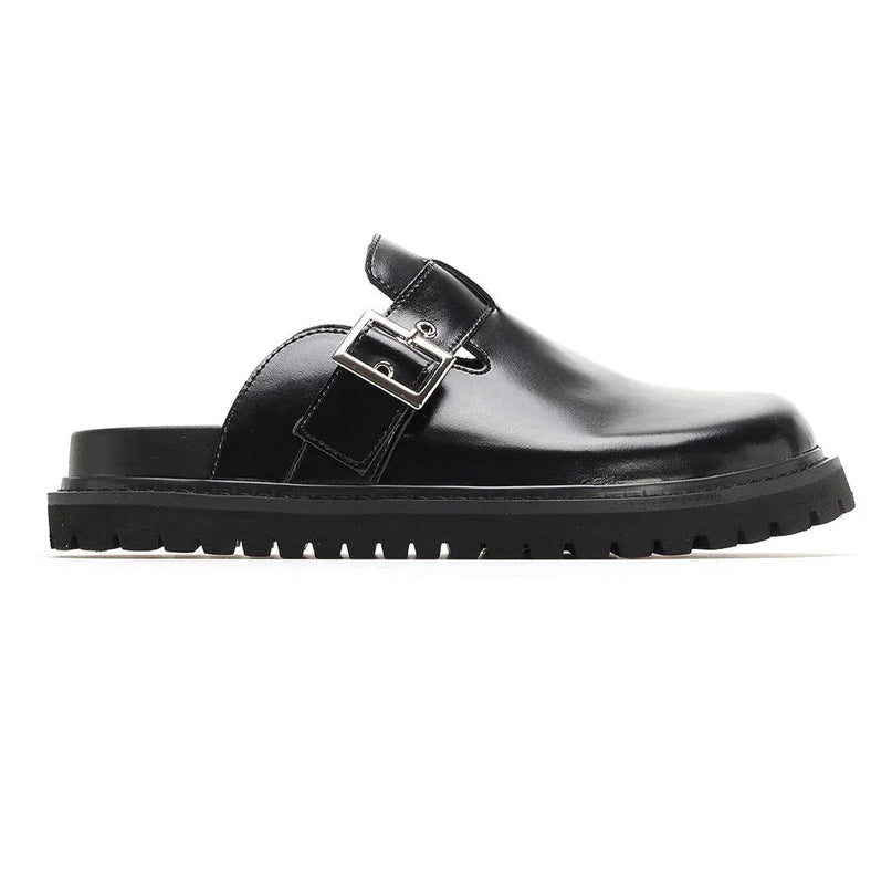 mule-noire-minimaliste-boucle-ajustable-semelle-rainuree