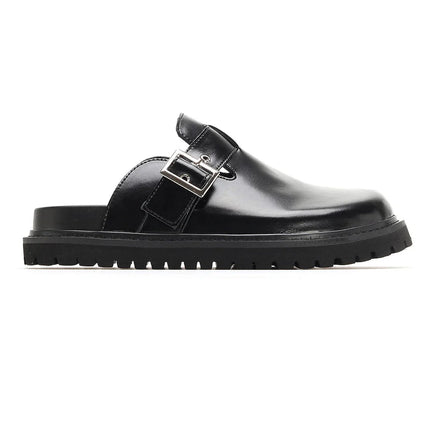 mule-noire-minimaliste-boucle-ajustable-semelle-rainuree