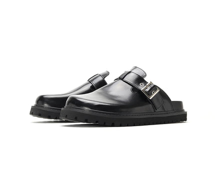 mule-noire-minimaliste-boucle-ajustable-semelle-rainuree