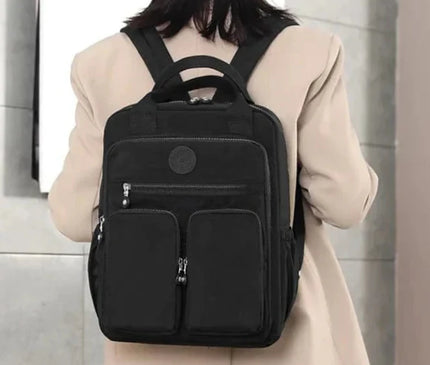sac-a-dos-noir-compact-multi-poches-zippes-36l-55l