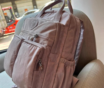 sac-a-dos-noir-compact-multi-poches-zippes-36l-55l