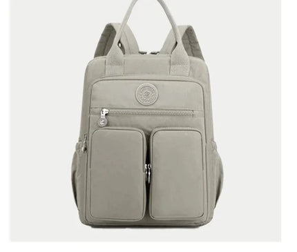 sac-a-dos-noir-compact-multi-poches-zippes-36l-55l