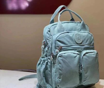 sac-a-dos-noir-compact-multi-poches-zippes-36l-55l