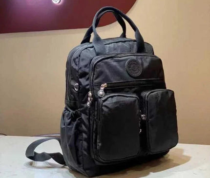 sac-a-dos-noir-compact-multi-poches-zippes-36l-55l