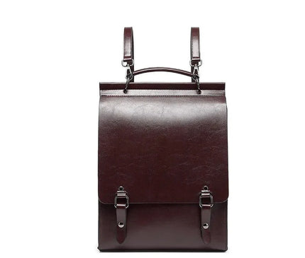 sac-a-dos-rigide-marron-avec-boucles-metalliques-design-retro-structure