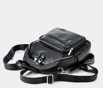 sac-compact-cuir-noir-arrondi-details-zippes