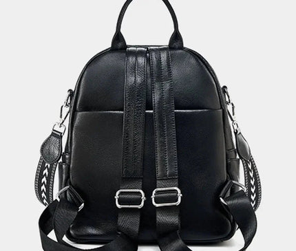 sac-compact-cuir-noir-arrondi-details-zippes