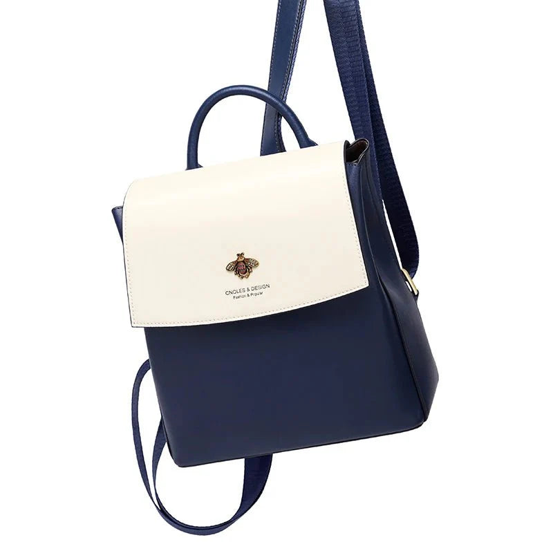 sac-a-dos-bleu-blanc-detail-abeille-doree