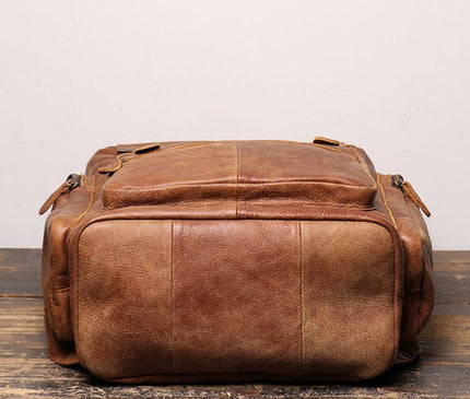 sac-baroudeur-cuir-brun-poches-multiples-design-retro-robuste