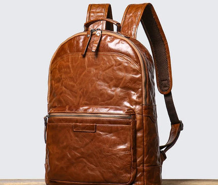 sac-a-dos-structure-marron-fermeture-zippee-grande-poche-frontale