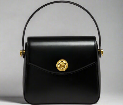 petit-sac-a-main-noir-detail-floral-dore
