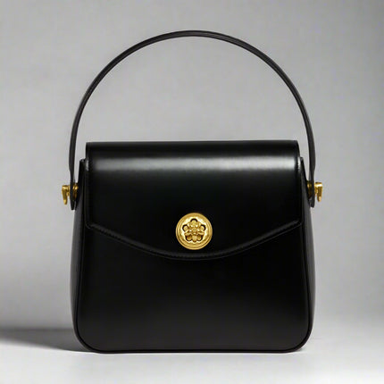 petit-sac-a-main-noir-detail-floral-dore