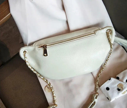 sac-banane-bleu-matelasse-zip-dore-pompon