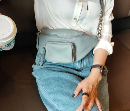 petit-sac-banane-noir-poche-frontale-compact-moderne