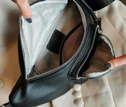 petit-sac-banane-noir-poche-frontale-compact-moderne