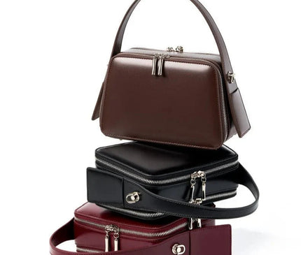 sac-bordeaux-rigide-bandouliere-poignees-argentees