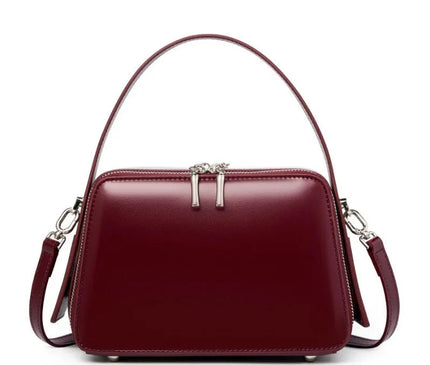sac-bordeaux-rigide-bandouliere-poignees-argentees