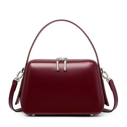 sac-bordeaux-rigide-bandouliere-poignees-argentees