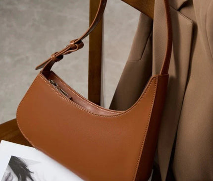 sac-hobo-noir-minimaliste-avec-bandouliere-a-noeud