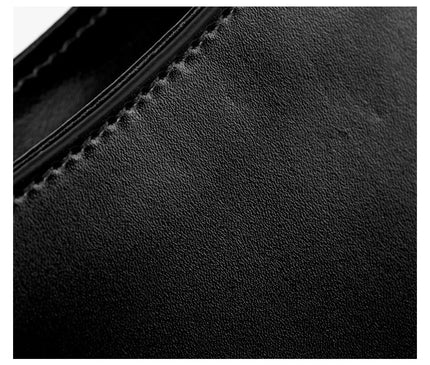 sac-hobo-noir-minimaliste-avec-bandouliere-a-noeud