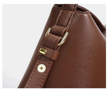 sac-moderne-marron-compact-poignee-rigide