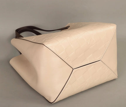 sac-rectangulaire-texture-tressee-boucle-doree