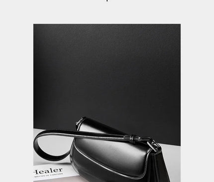sac-noir-minimaliste-rabat-arrondi