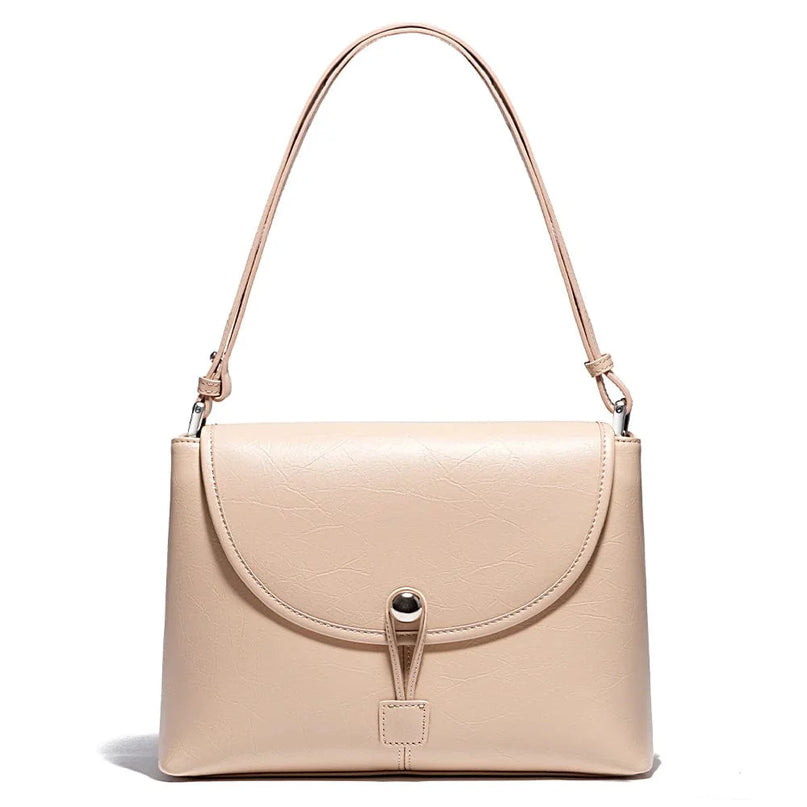 sac-a-bandouliere-beige-design-minimaliste-fermeture-a-bouton-pression