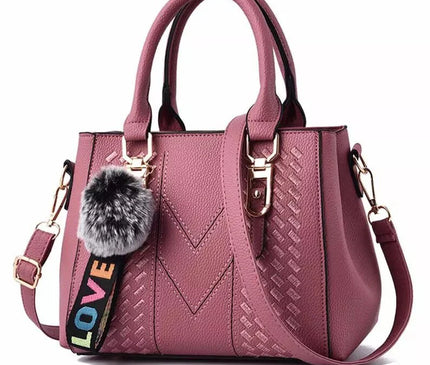 sac-a-main-compact-avec-sangle-ajustable-et-pompon