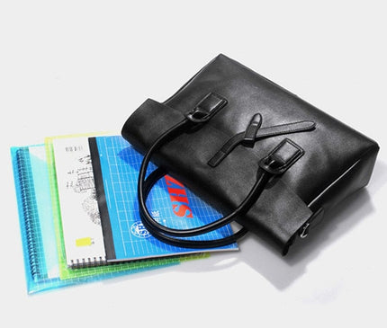 sac-noir-structure-fermeture-croisee-minimalisme-contemporain