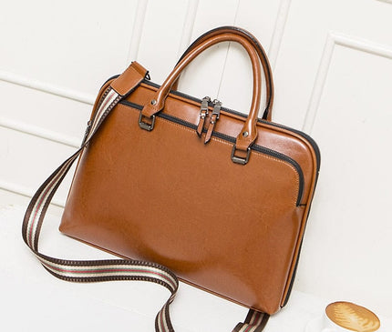 sac-rectangulaire-cuir-brun-sangle-rayee-poignees-arrondies