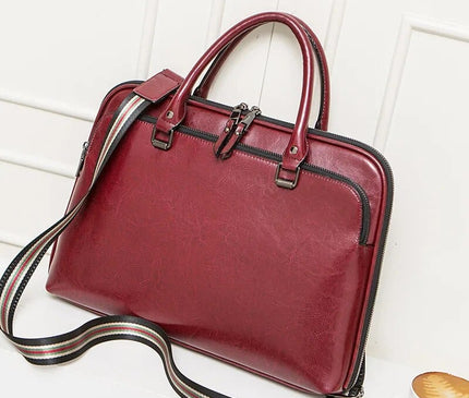 sac-rectangulaire-cuir-brun-sangle-rayee-poignees-arrondies