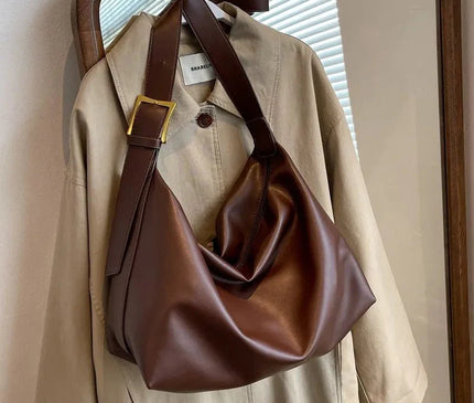 sac-bandouliere-noir-minimaliste-design-polyvalent