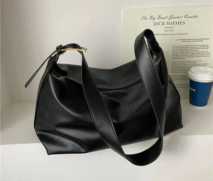 sac-bandouliere-noir-minimaliste-design-polyvalent