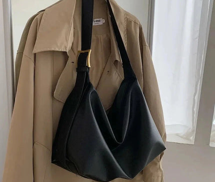 sac-bandouliere-noir-minimaliste-design-polyvalent