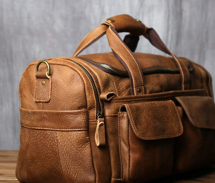 sac-de-voyage-marron-avec-poches-a-rabat