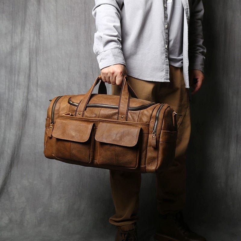 sac-de-voyage-marron-avec-poches-a-rabat
