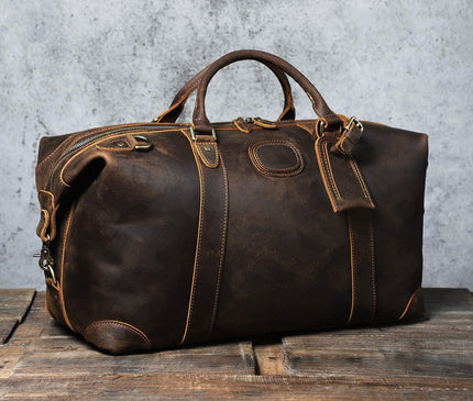 sac-de-voyage-patine-bandouliere-poignee