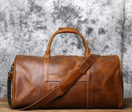 Sac de voyage rectangulaire en cuir patiné avec sangle ajustable