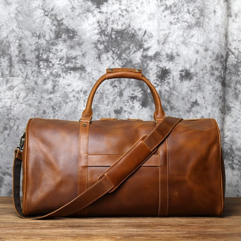 Sac de voyage rectangulaire en cuir patiné avec sangle ajustable