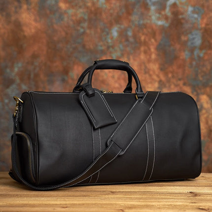 sac-de-voyage-rectangulaire-noir-coutures-contrastees